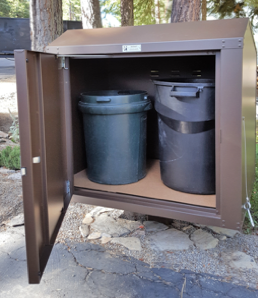 our LC-232a enclosure is designed to hold TWO Round 30-GALLON trash cans or ONE Round 32-Gallon and ONE ROUND 30-Gallon trash cans with space inside for a couple recycling bags.  - 